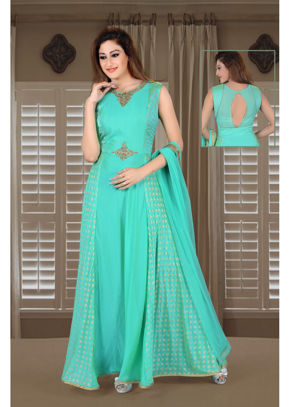 BOTTLE GREEN DRAPED GOWN SET WITH AN EMBROIDERED BODICE AND A 3D SHOULDER  DETAIL - Seasons India