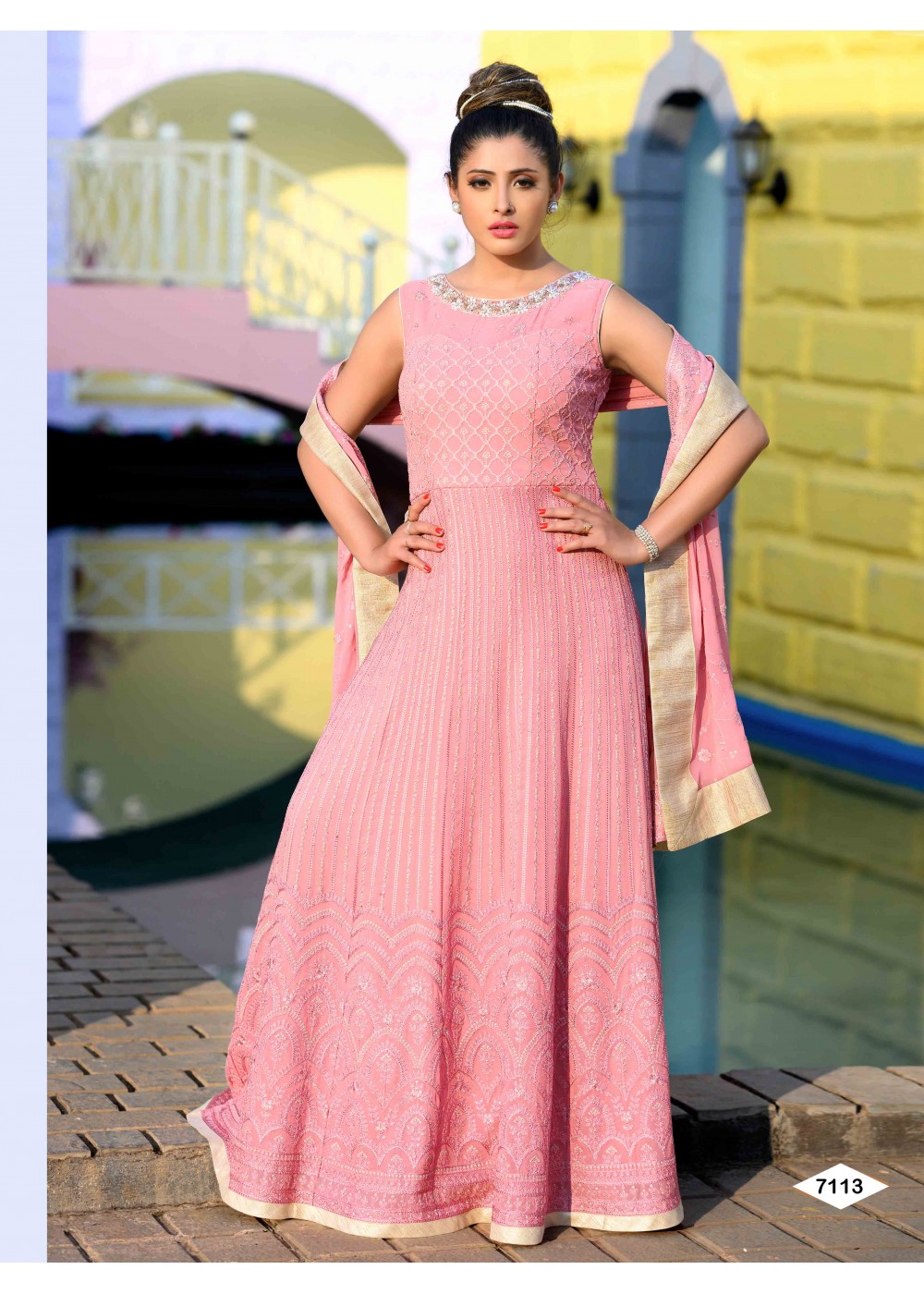 New designer best-embroidered gown light pink color with a price.